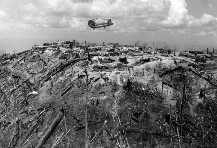 A supply helicopter comes in for a landing on a hilltop forming part of Fire Support Base 29, west of Dak To in South Vietnam's central highlands on June 3, 1968. Around the fire base are burnt out trees caused by heavy air strikes from fighting between North Vietnamese and American troops. (AP Photo)